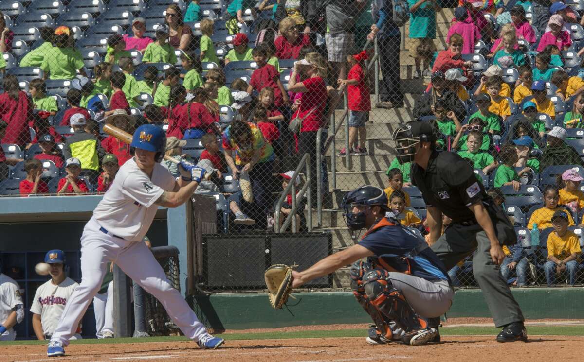 RockHounds' Brett Vertigan takes a ball 5/03/17 with the stands full of area school children during kids day at Security Bank Ballpark against the Corpus Christi Hooks. Tim Fischer/Reporter-Telegram