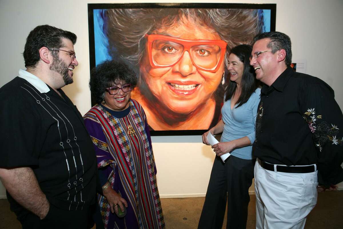 Daniel Guerrero (left), Ellen Riojas Clark, Elizabeth Rodriguez (artist) and Arturo Almeida (curator) were at the Art Latina exhibit in 2008 at Blue Star.