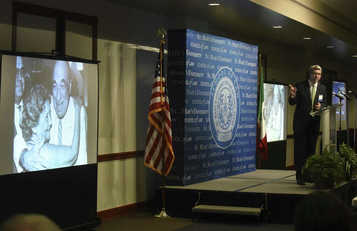 Henry B. Gonzalez III, right, speaks about his grandparents, Congressman Henry B. Gonzalez and wife Bertha, as an image of them is projected during the Gran Final of the Henry B. Gonzalez Centennial at St. Mary's University on Wednesday, May 3, 2017. The Congressman, who died in 2000, was a graduate of the St. Mary's School of Law.