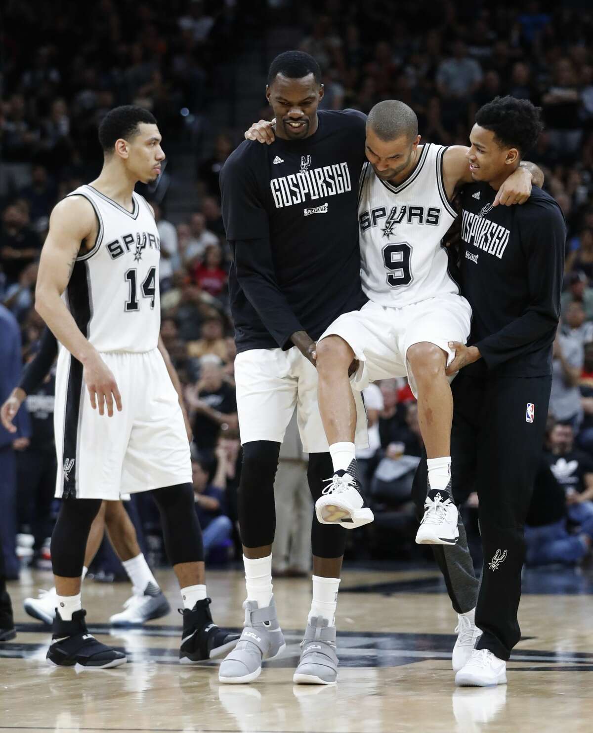 San Antonio Spurs guard Tony Parker (9) is carried off the court after being injured during the second half of Game 2 of the second-round of the Western Conference NBA playoffs at AT&T Center, Wednesday, May 3, 2017, in San Antonio. ( Karen Warren / Houston Chronicle )