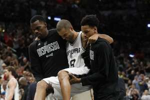 Spurs' Tony Parker sustains left leg injury and is carried off of the court