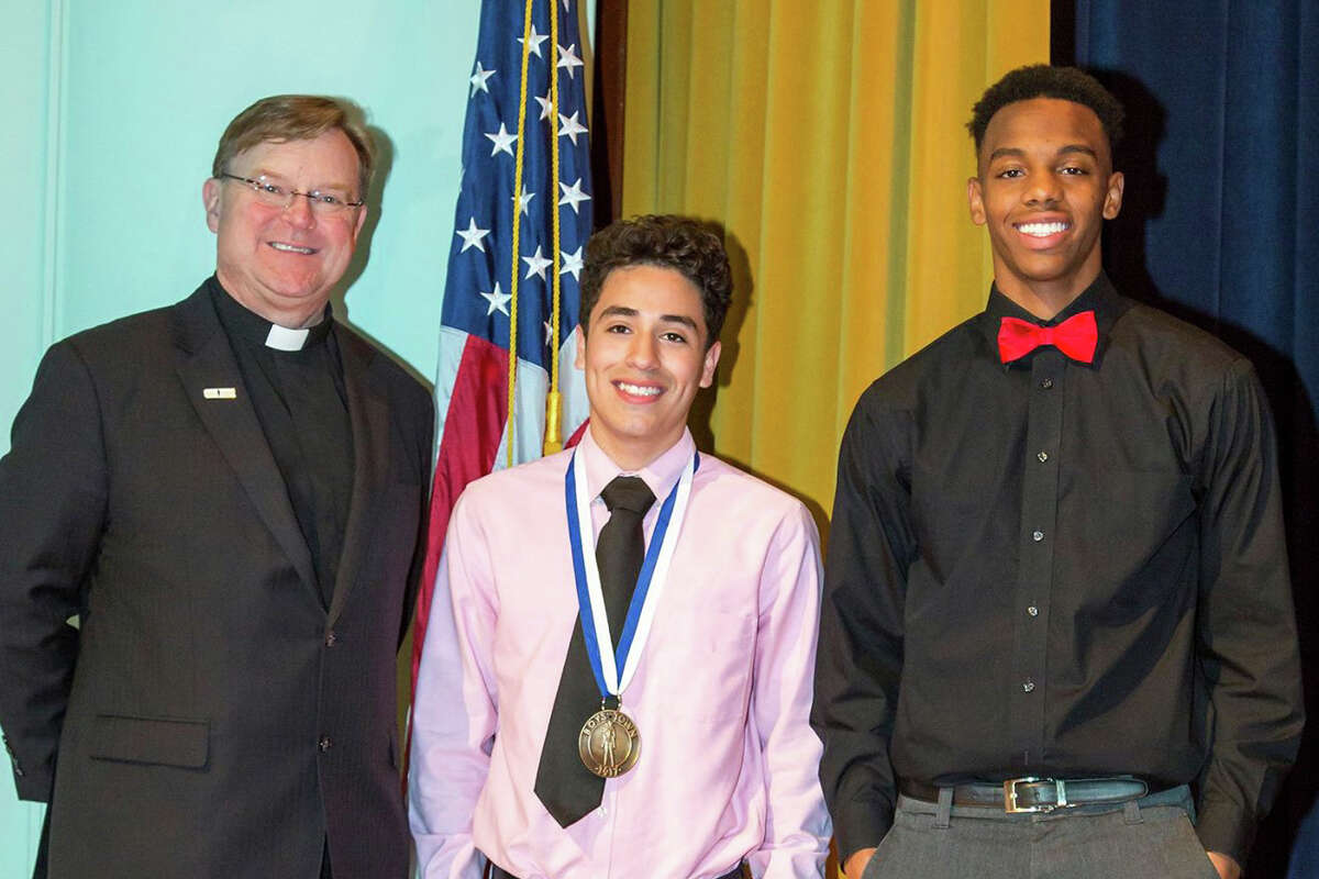 Jason Landin (center) is pictured with Vice Mayor TiJaih Davis (right) and Father Flanagan (left). Click ahead to see 18 facts about the quirky political history of Texas politics.