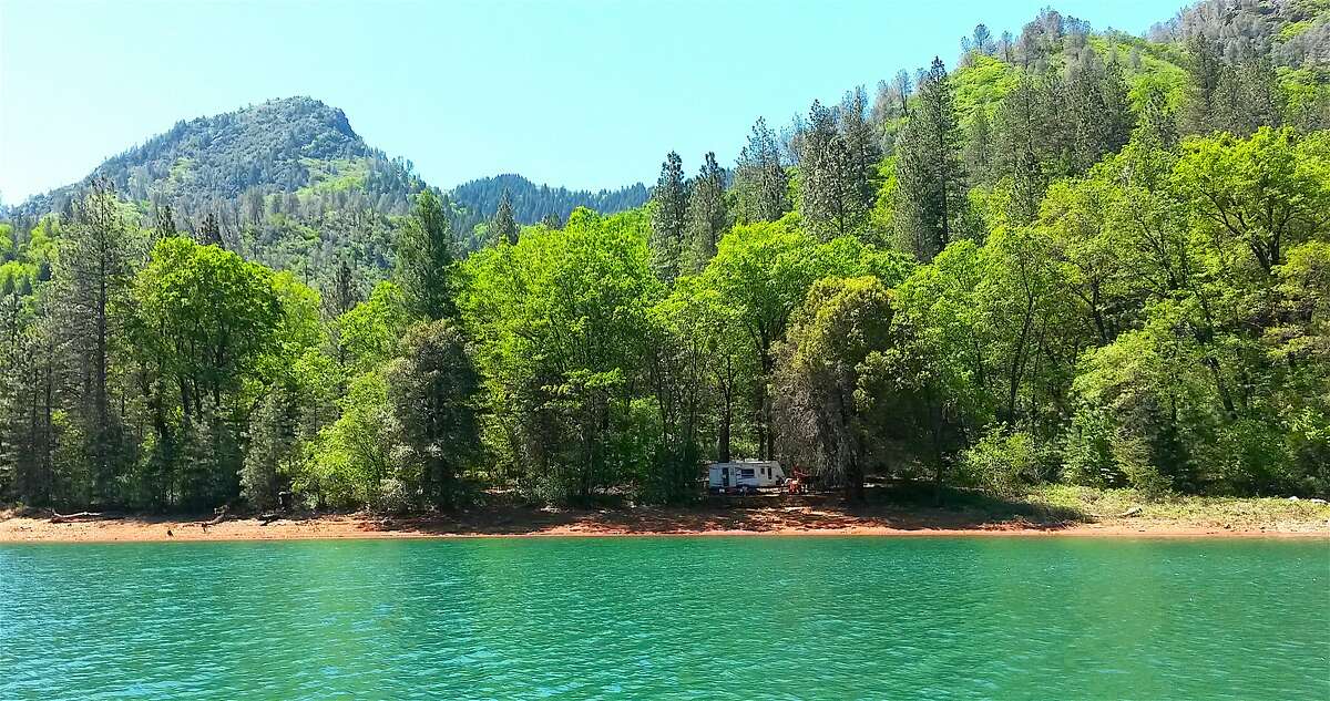 This lakeside campsite is at the Dekkas Rock Campground at Shasta Lake in Northern California