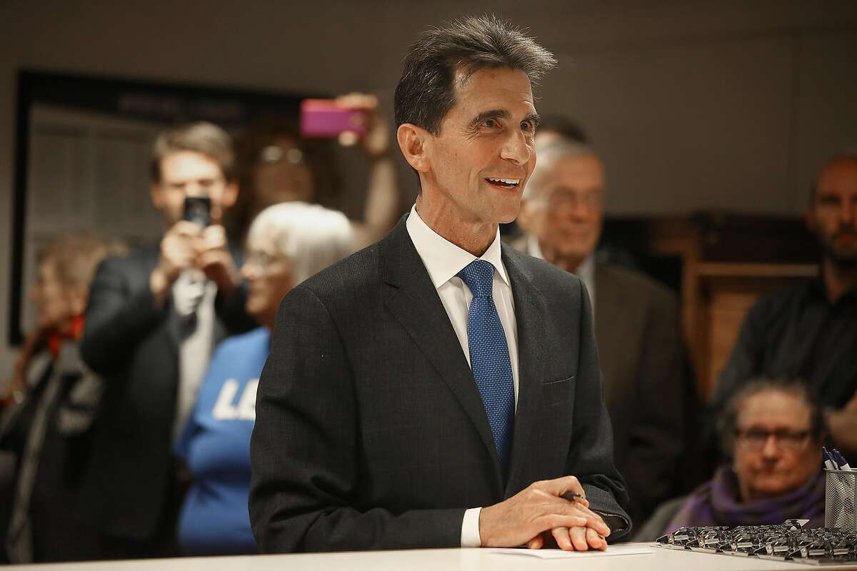 Former San Francisco supervisor and state Sen. Mark Leno initializes his intent to run for mayor at the department of elections on Thursday, May 4, 2017, in city hall in San Francisco, Calif.