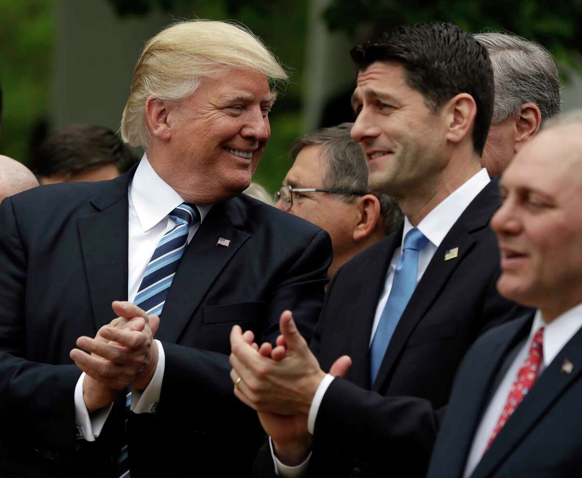President Donald Trump talks to House Speaker Paul Ryan of Wis. in the Rose Garden of the White House in Washington, Thursday, May 4, 2017, after the House pushed through a health care bill.