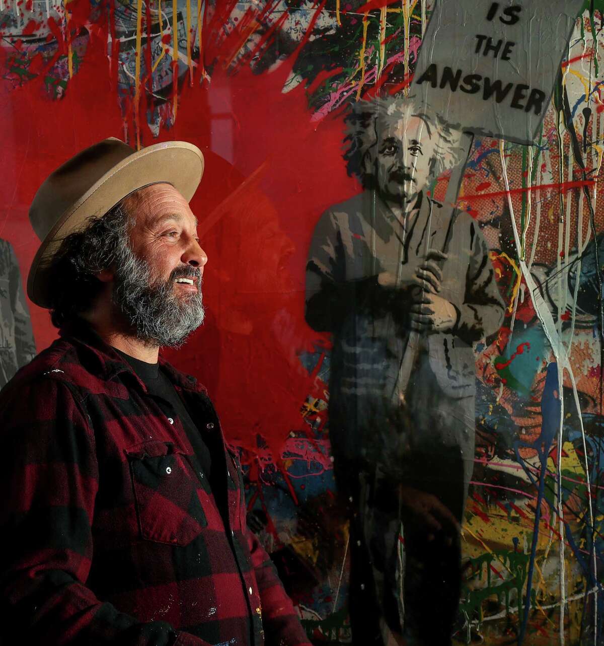 Mr. Brainwash playfully poses for a portrait at Art of the World Gallery, Wednesday, April 26, 2017, in Houston. ( Jon Shapley / Houston Chronicle )