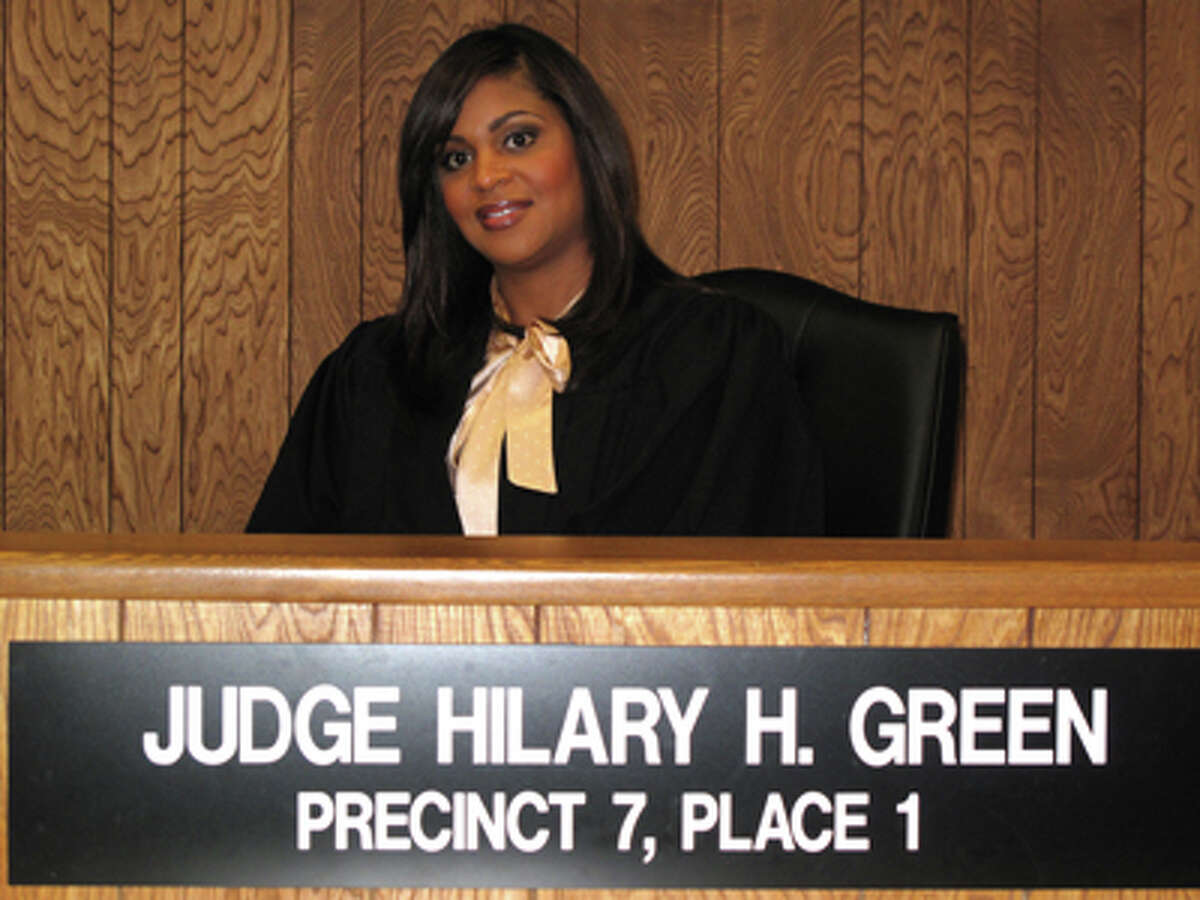 Houston-based Justice of the Peace Hilary Green has admitted that she 'sexted' and used drugs while on the bench - but is fighting her removal from office.