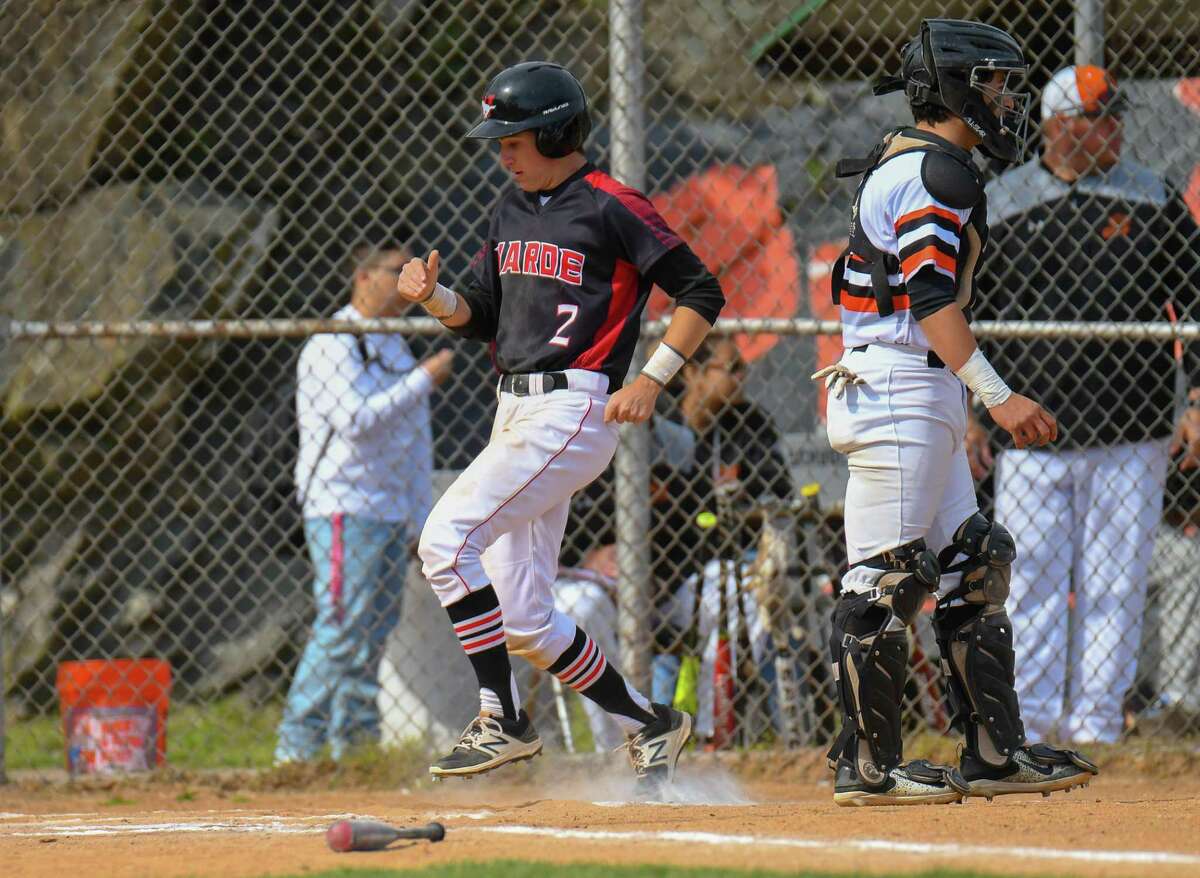 Ryan Donnelly (2) of the Fairfield Warde Mustangs crosses home plate during a game against the Stamford Black Knights at Stamford High School on May 4, 2017 in Stamford, Connecticut.
