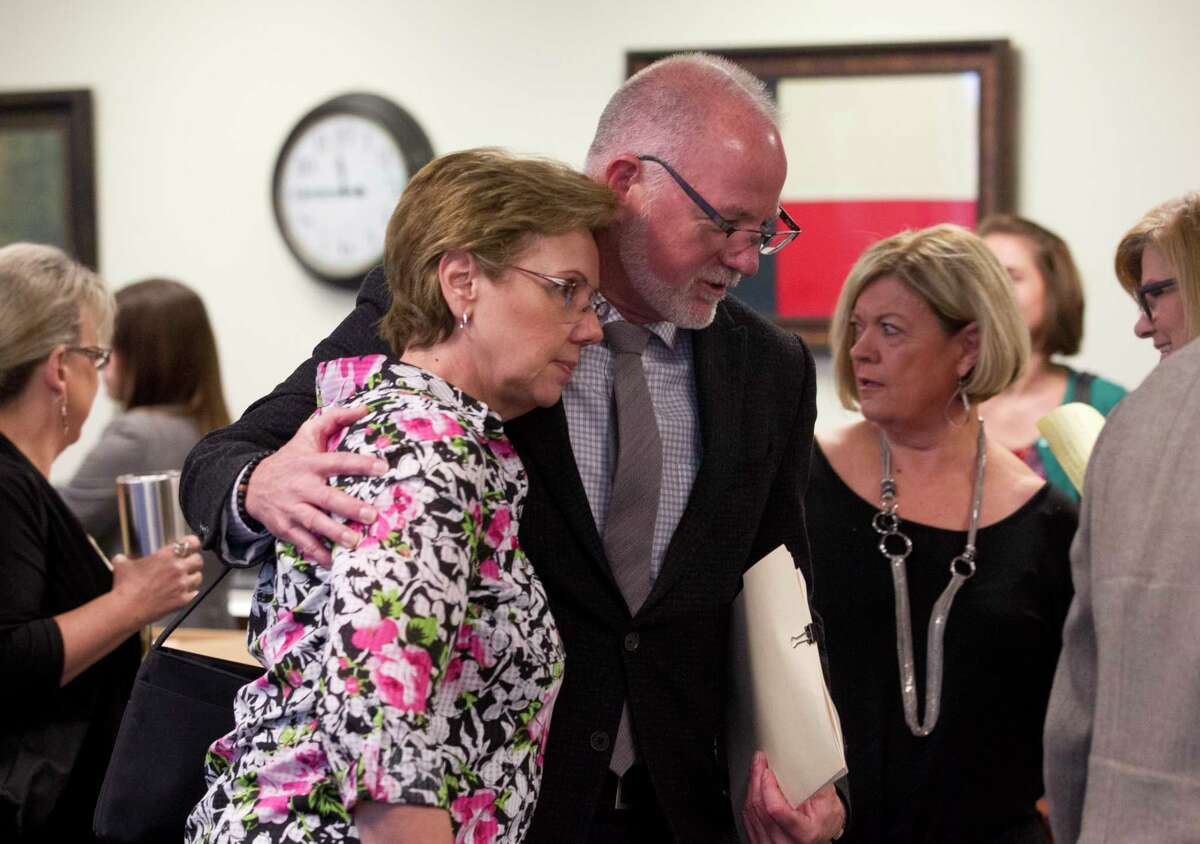Charlie Lumpkin, center, is seen during a break in the sentencing hearing of Ronald Cooper in the 359th state District Court, Thursday at the Montgomery County Courthouse, May 4, 2017, in Conroe. Cooper, 69, was found guilty of driving high on prescription pills and crashing into the sedan of Lumpkin's brother-in-law Roland Sedlmeier, killing him, his wife and his two daughters as they headed home from church on a bright Sunday afternoon in 2015.