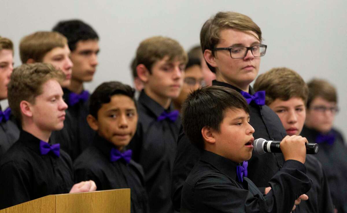 Members of the men's choir from Montgomery Junior High School perform during a gathering in observation of the National Day of Prayer at the Lone Star Community Center, Thursday, May 4, 2017, in Montgomery.