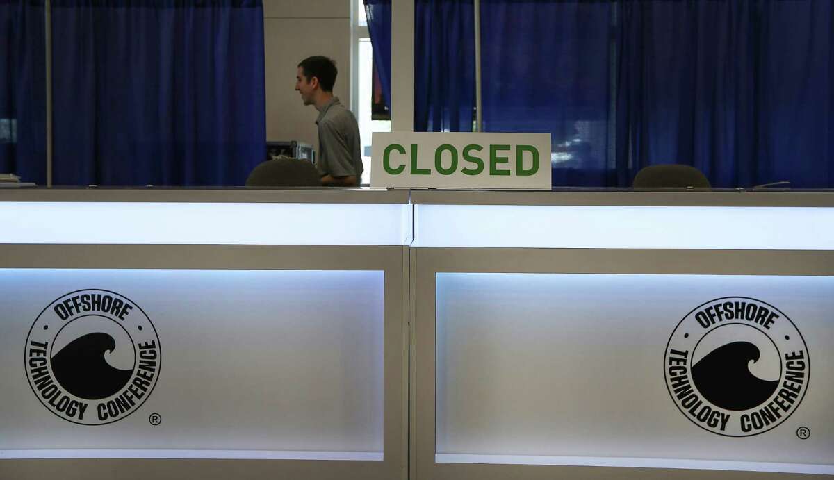 A closed sign on the registration desk as the 2017 Offshore Technology Conference (OTC 2017) officially closed Thursday, May 4, 2017, in Houston. ( Steve Gonzales / Houston Chronicle )