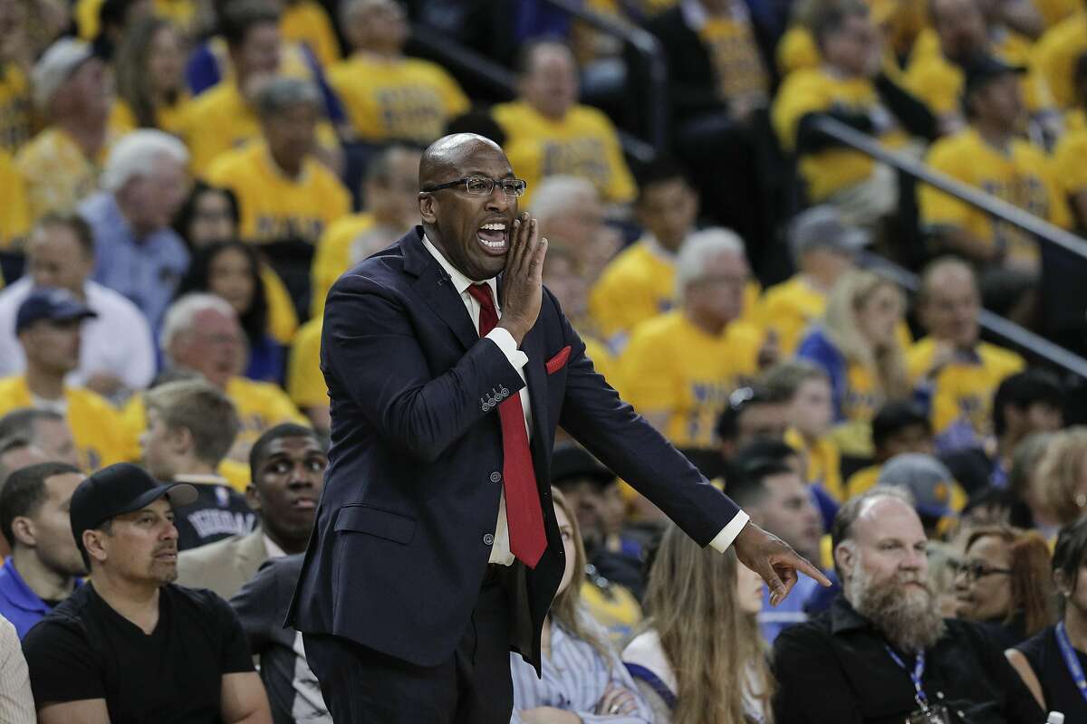 Golden State Warriors' Mike Brown calls out to his players in the second quarter during Game 2 of the Western Conference Semifinals 2017 NBA Playoffs at Oracle Arena on Thursday, May 4, 2017 in Oakland, Calif.