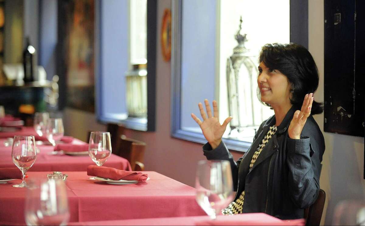 Ramya Subramanian talks about the British Indian influences she and her husband have brought to the Viceroy Publik House restaurant on Summer Street in Stamford on Wednesday, April 26, 2017.