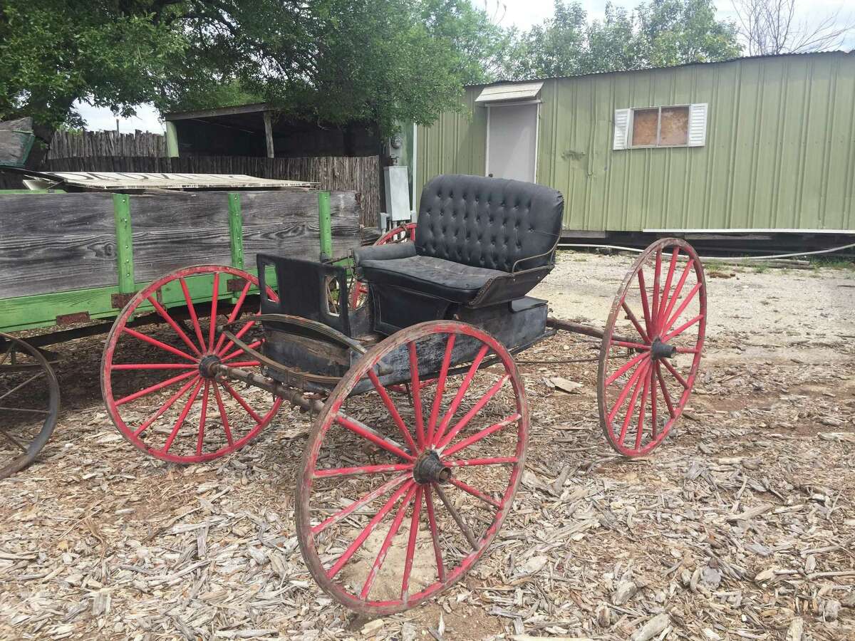 A plain, regular buggy that was common in San Antonio during the 1800s, on display at Blanco's Buggy Barn Museum.