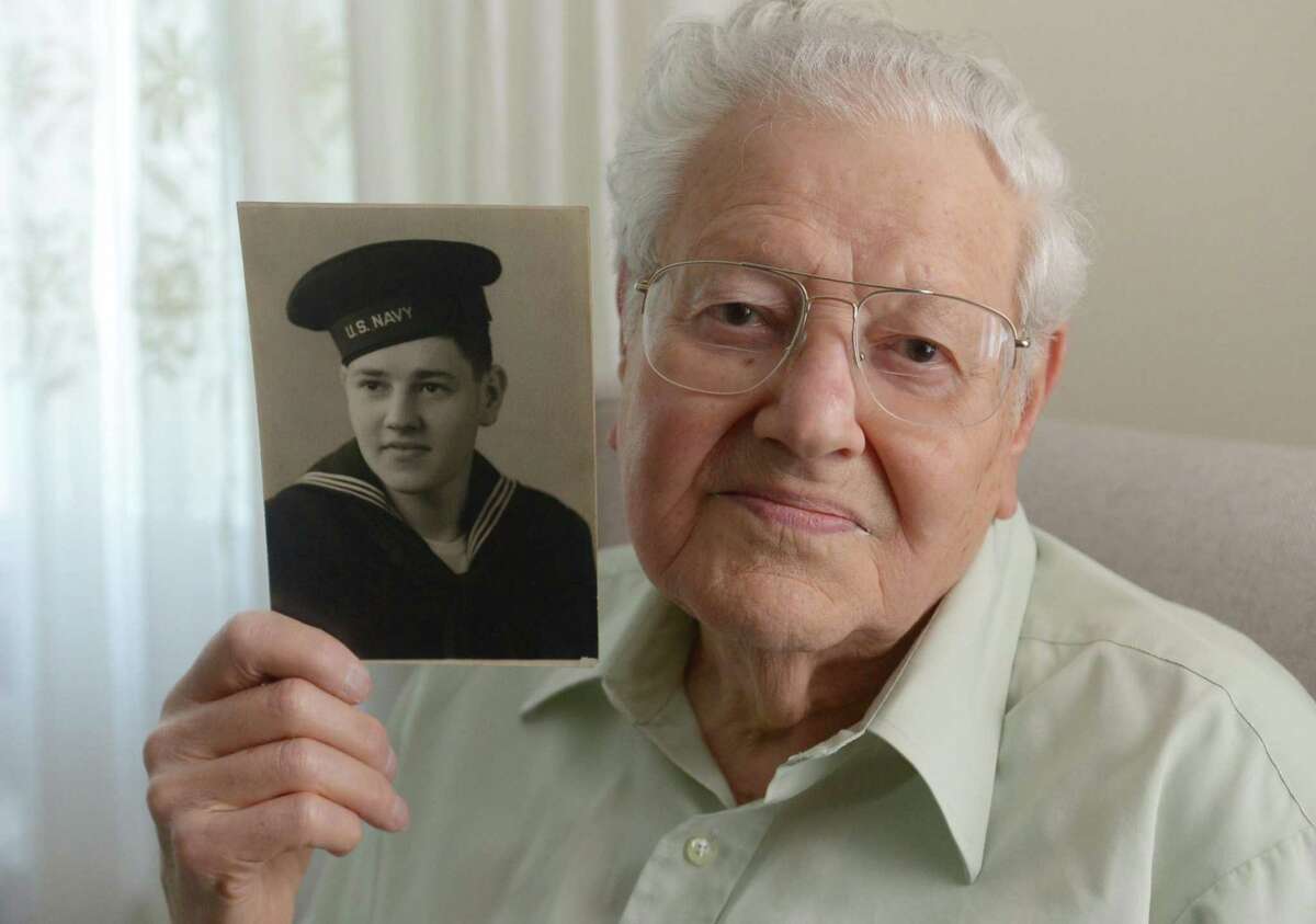 Henry Simon, a U.S. Navy veteran who served aboard a medical ship in the Pacific Ocean during World War II talks about his experiences Thursday, May 4, 2017, at his home in Norwalk, Conn. Simon will serve as grand marshal in the Norwalk Veterans Memorial Committee 2017 Memorial Day Parade.