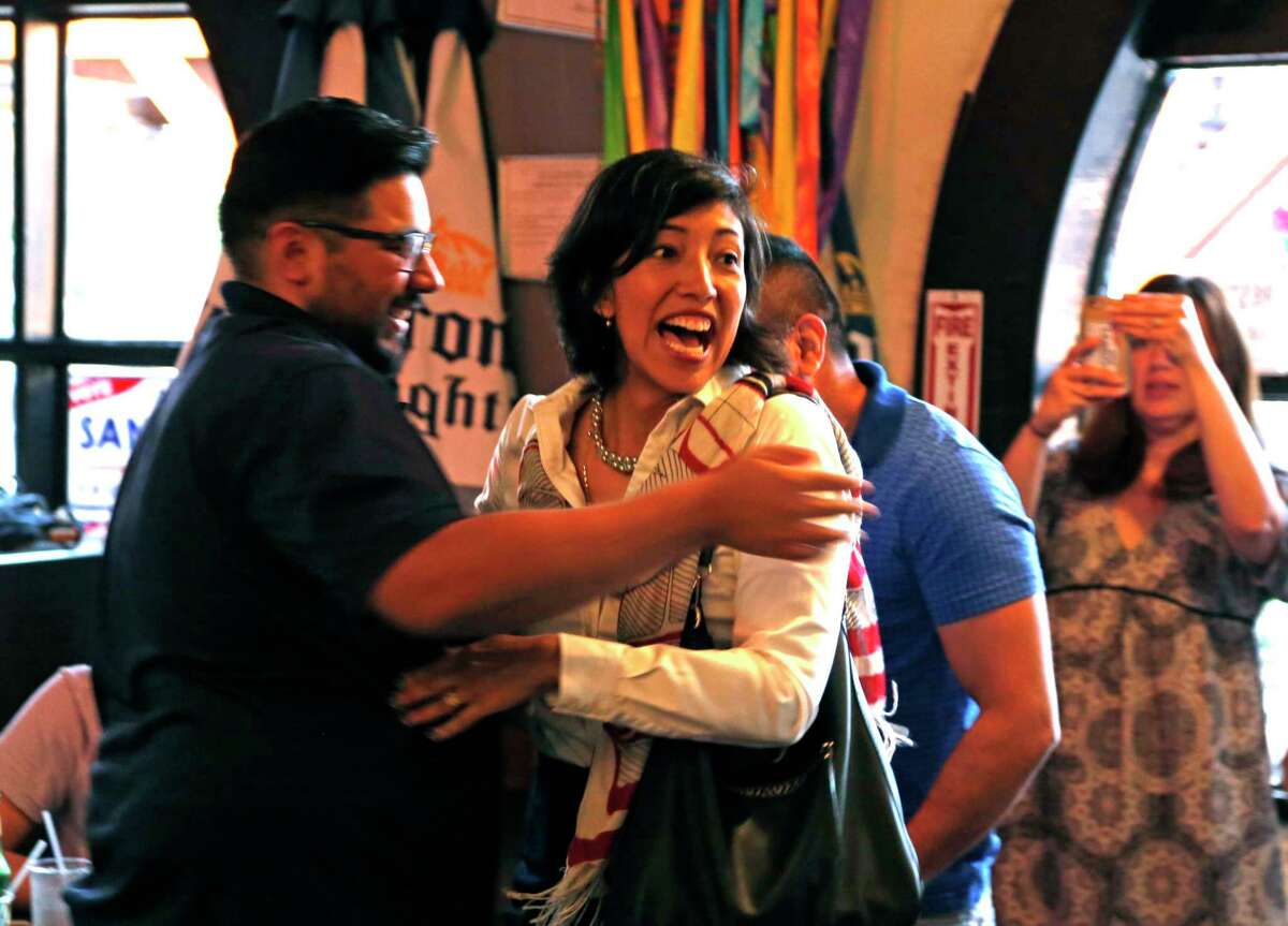 Ana Sandoval reacts after arriving to cheers from supporters including Jesse Salinas,on left, at Deco Pizza. Anna Sandoval is running in District 7 Ana Sandoval could force a runoff in the District 7 race. on Saturday, May 6, 2017.