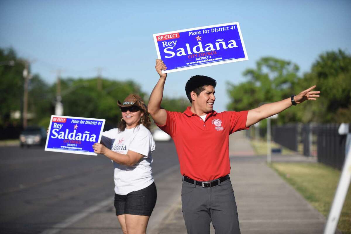 Rey Saldana, District 4 councilman, campaigns with his mother, Maricela Saldaña, in 2017 at Kazan Middle School, which he once attended.
