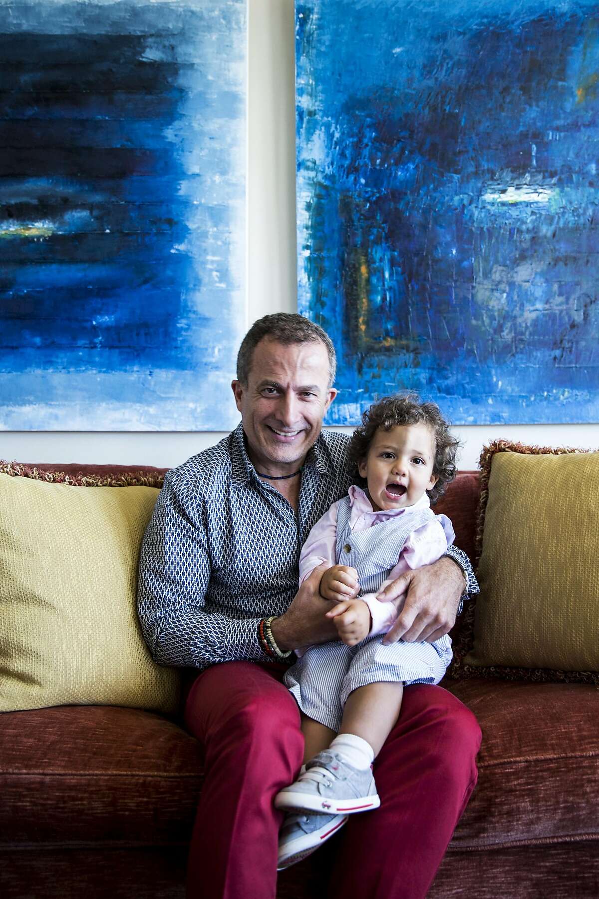 Jorge Maumer, a real estate developer and single gay dad, poses for a portrait with his son Augustine, who was conceived through a gestational carrier in Panama after two previously unsuccessful attempts, at their home in San Francisco, Calif. on Friday, May 5, 2017.
