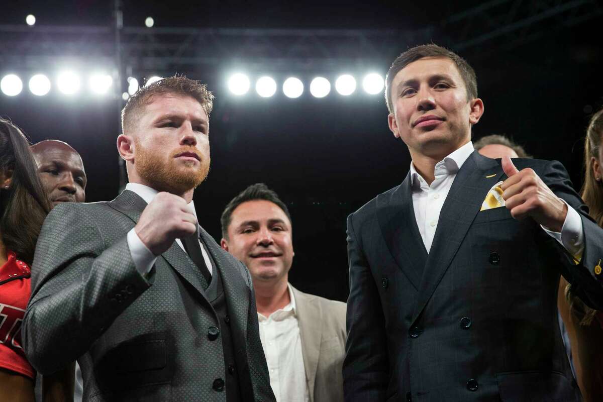Saul "Canelo" Alvarez, left, and Gennady Golovkin pose on Saturday, May 6, 2017, in Las Vegas. The two boxing fighters will fight Sept. 16. (Erik Verduzco/Las Vegas Review-Journal via AP)