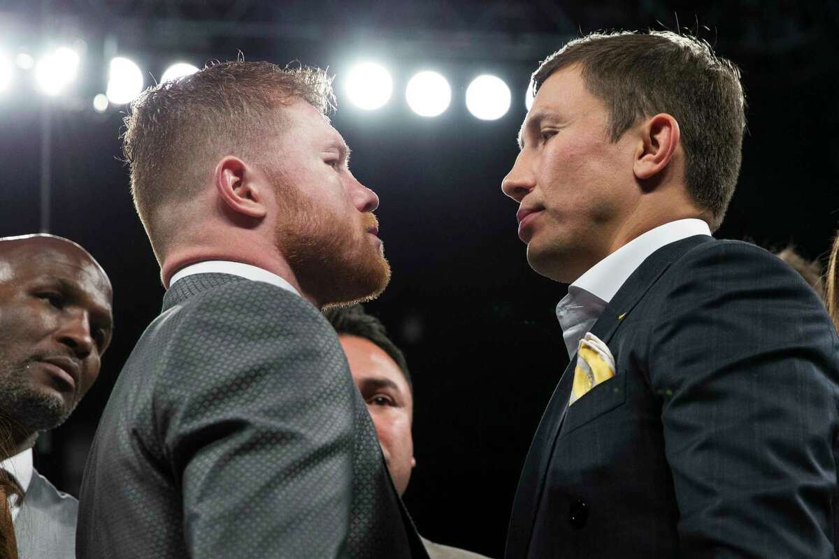 CORRECTS SOURCE TO LAS VEGAS REVIEW-JOURNAL FROM LAS VEGAS SUN - Saul "Canelo" Alvarez, left, and Gennady Golovkin face each other on Saturday, May 6, 2017, in Las Vegas. The two boxing fighters will fight Sept. 16. (Erik Verduzco/Las Vegas Review-Journal via AP)
