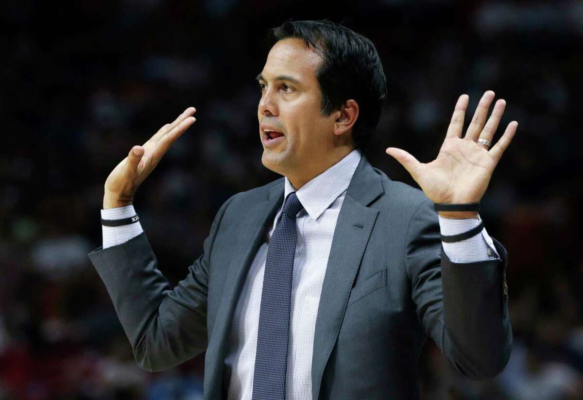 FILE - In this Sunday, March 19, 2017, file photo, Miami Heat head coach Erik Spoelstra reacts during the second half of an NBA basketball game against the Portland Trail Blazers, in Miami. Spoelstra and Mike DÂ?’Antoni are the co-winners of the National Basketball Coaches AssociationÂ?’s coach of the year award, announced Sunday, May 7, 2017. (AP Photo/Lynne Sladky, File)