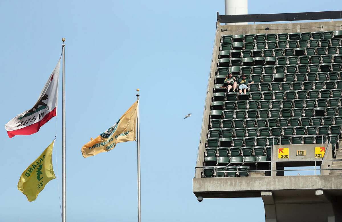 Oakland Athletics' fans enjoy the view from the upper deck during MLB game against Detroit Tigers at Oakland Coliseum in Oakland, Calif., on Sunday, May 7, 2017.