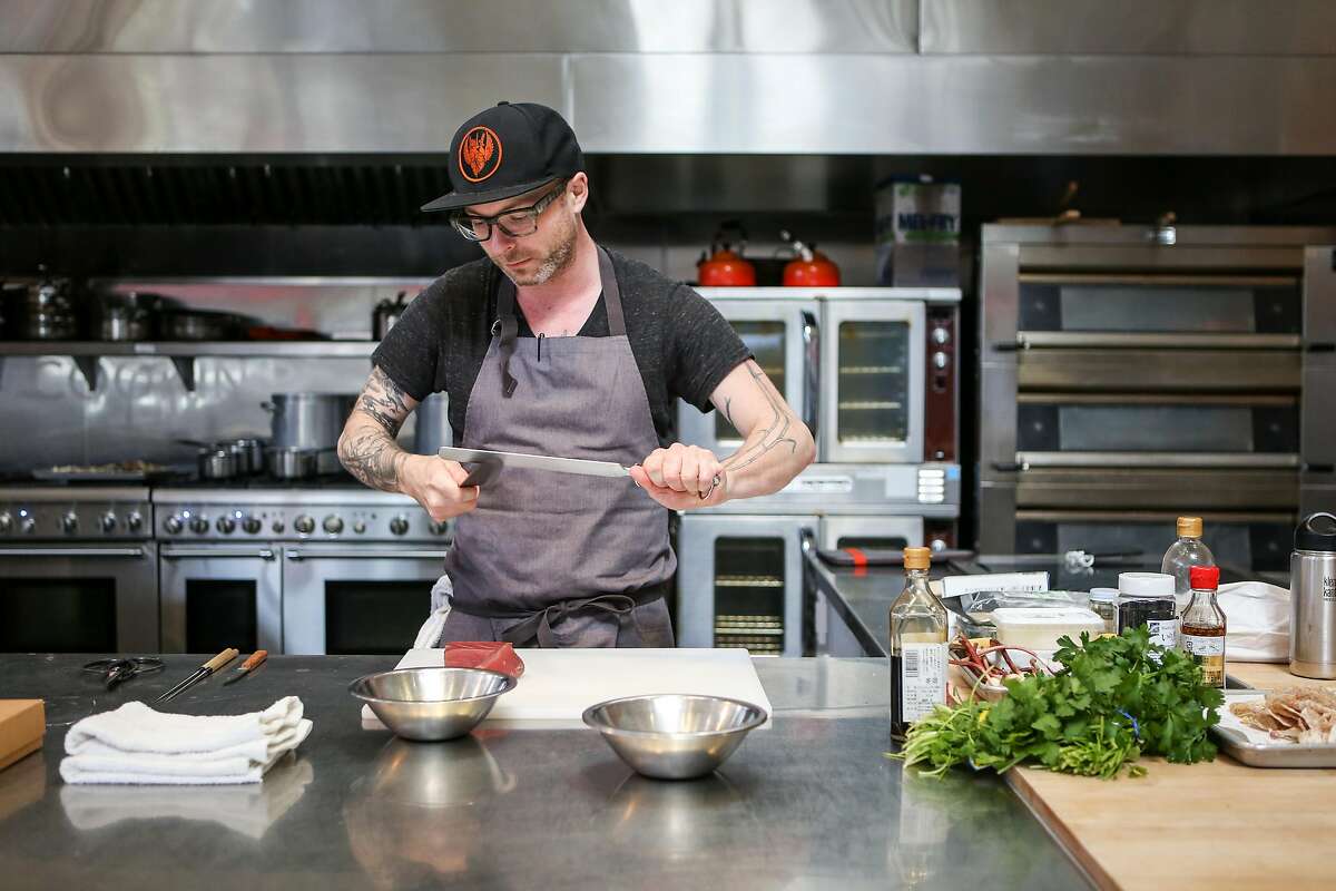 Anthony Strong sharpens a knife as he prepares some of his newest dishes for his new cooking venture Young Fava on Sunday, May 6, 2017 in San Francisco, Calif.