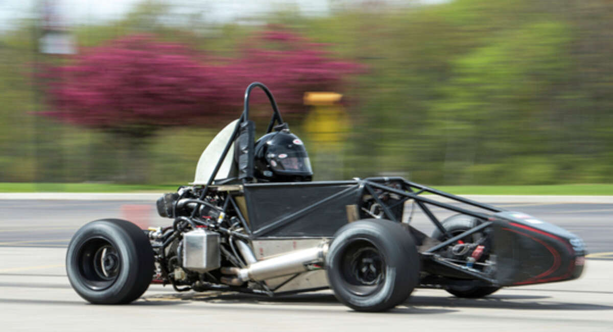 Mike Randolph | SVSU Saginaw Valley State University Cardinal Formula Racing's car is driven on campus Wednesday, May 3.