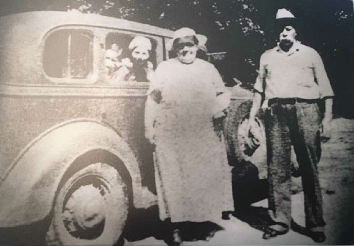 Sam Godsey, right, with his wife, Ethel, and their children, Lorene and Clifford, in 1935. Godsey bought this car with money he received in a settlement after he was burned when gas from a train car ignited as he was traveling across the road. Lorene is Shirley Walker Meadows' mother.