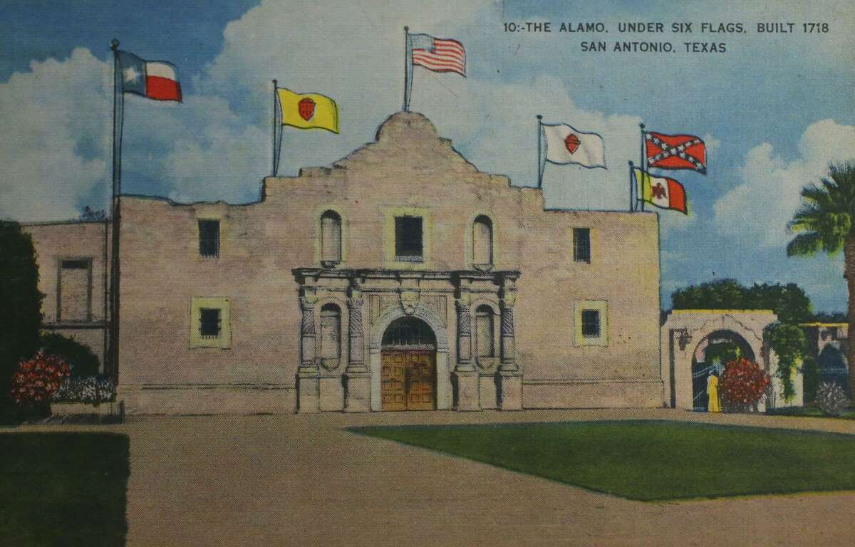 A historic postcard of the Alamo, embellished with drawings of flags that have flown over parts of Texas.