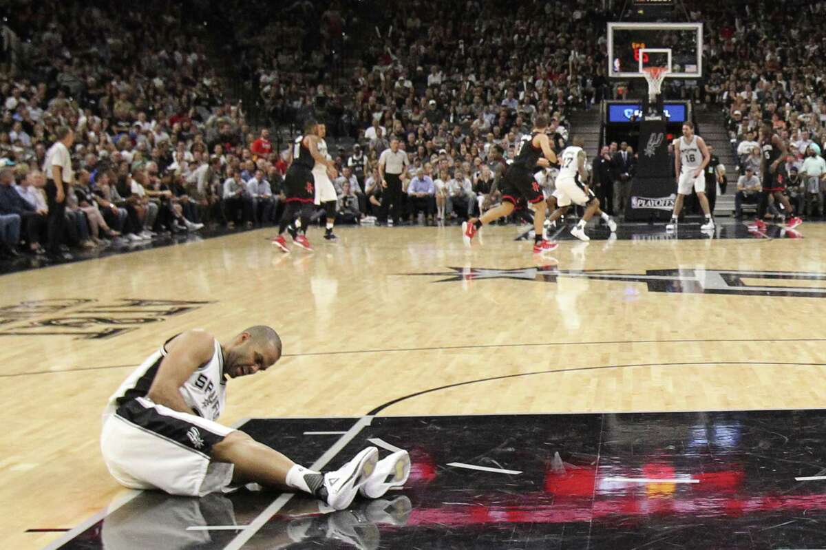 San Antonio Spurs?’ Tony Parker lies on the floor after getting lies on the floor after getting injured in the fourth quarter of game two in the Western Conference semifinals against the Houston Rockets at the AT&T Center, Wednesday, May 3, 2017. The Spur won 121-96 to even the series at 1-1.