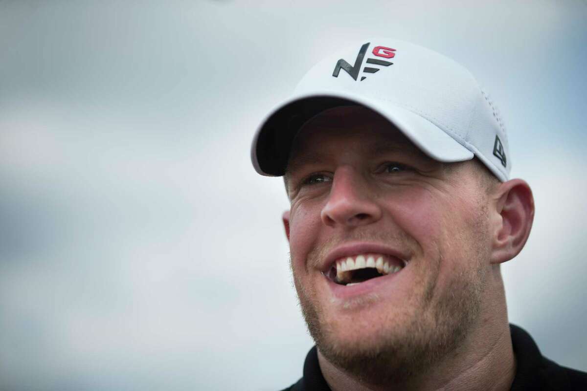 Texans J.J. Watt laughs during a press conference before a golf tournament to raise funds for charity at River Oaks Country Club, Monday, May 8, 2017, in Houston .