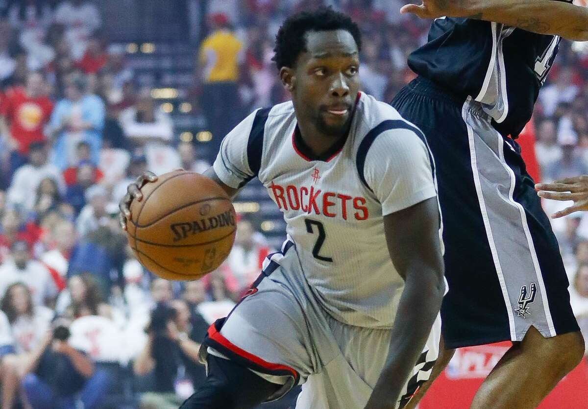 Rockets guard Patrick Beverley drives behind the Spurs’ LaMarcus Aldridge during the first half of Game 4 at the Toyota Center on May 7, 2017, in Houston.