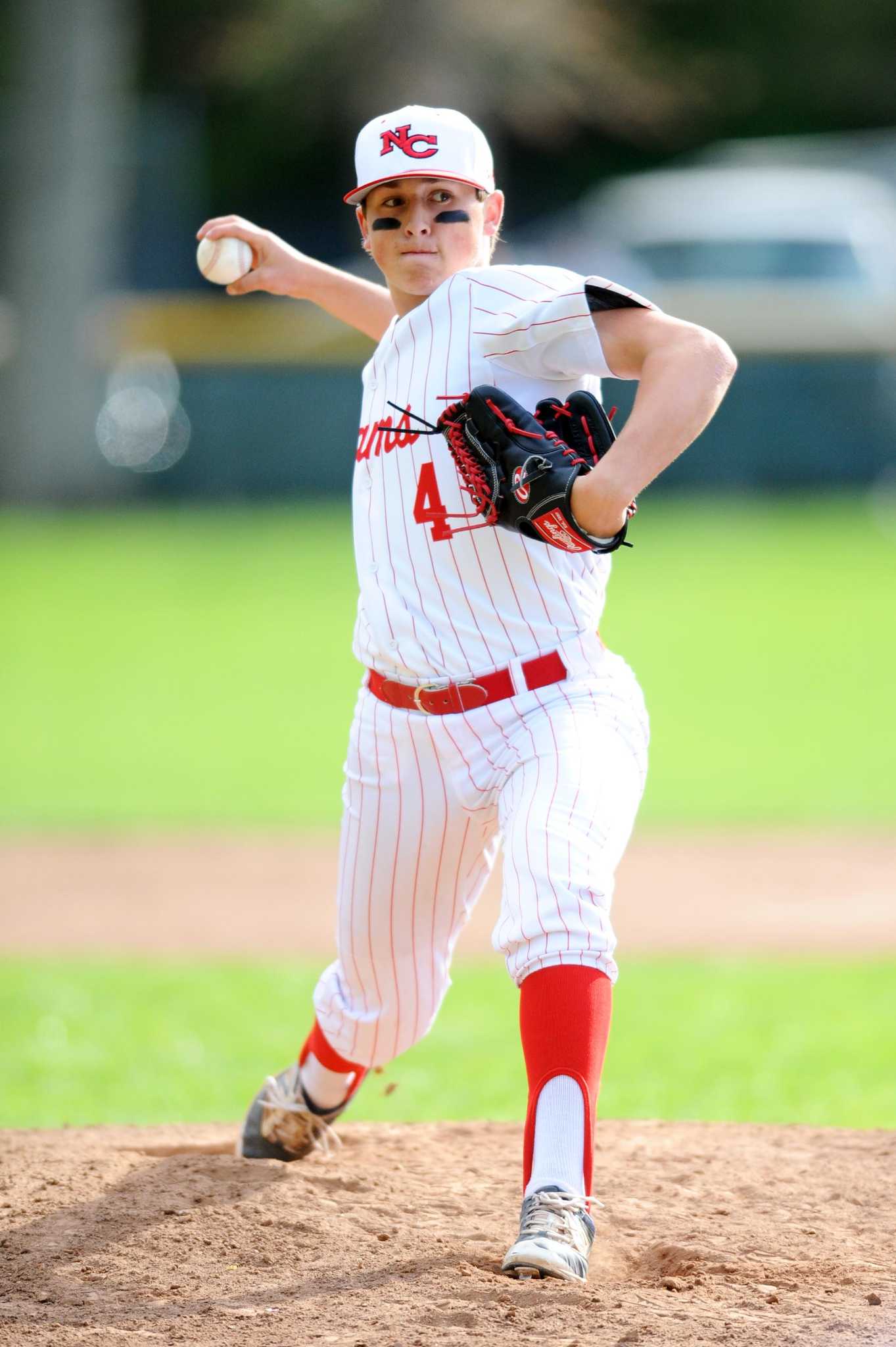 New Canaan scores four in 7th to stun Darien