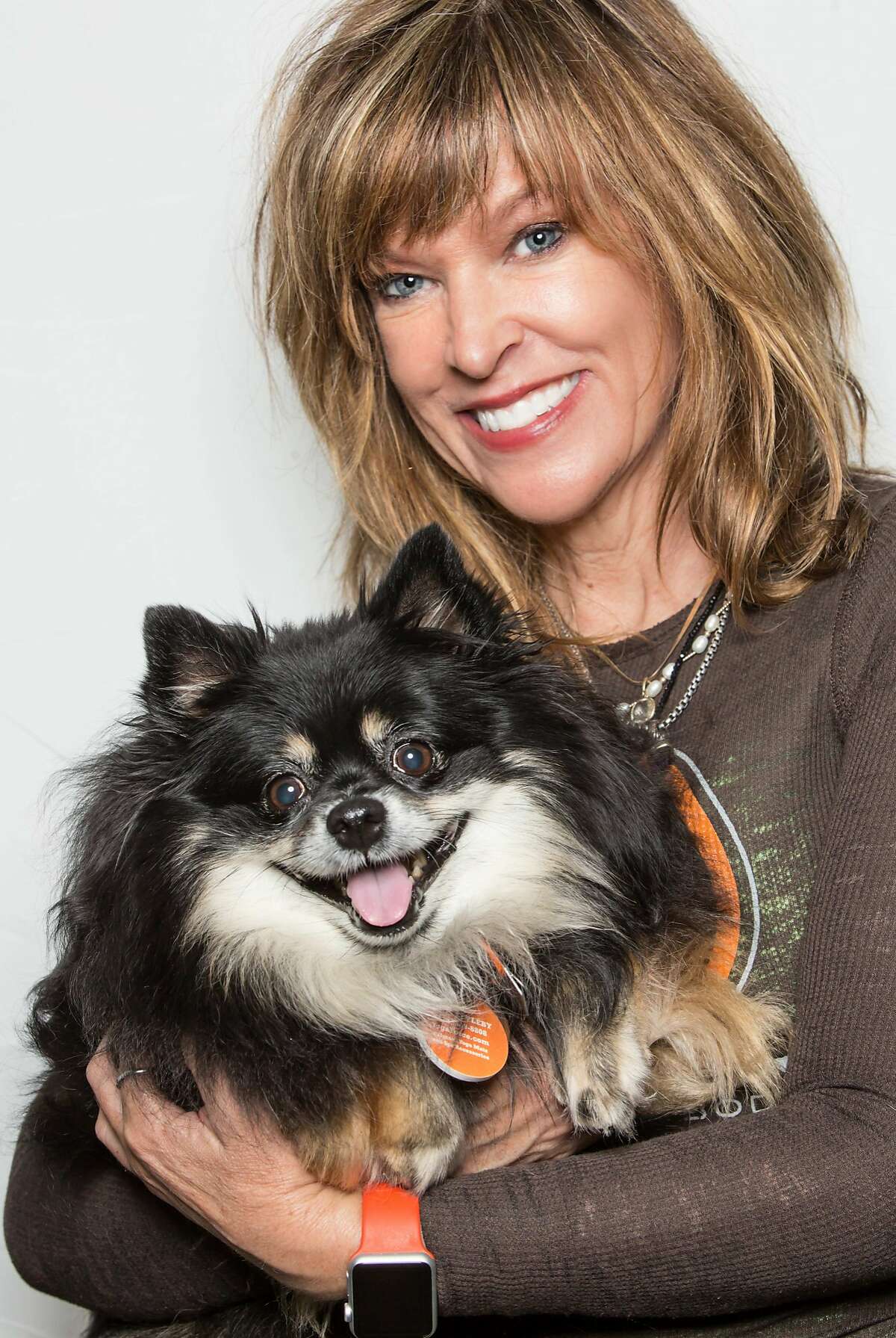 Anne Appleby, founder of YogaForce, will be teaching "doga" (dog yoga) May 18 at Wilkes Bashford Palo Alto. The event benefits the Peninsula Humane Society and the SPCA.