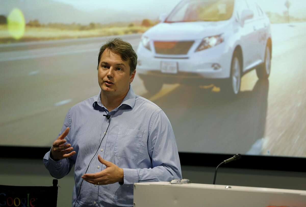 Chris Urmson, director of Google's Self Driving Cars Project, gives a presentation to reporters at a Google facility in Mountain View, California, on Tuesday, Sept. 29, 2015.