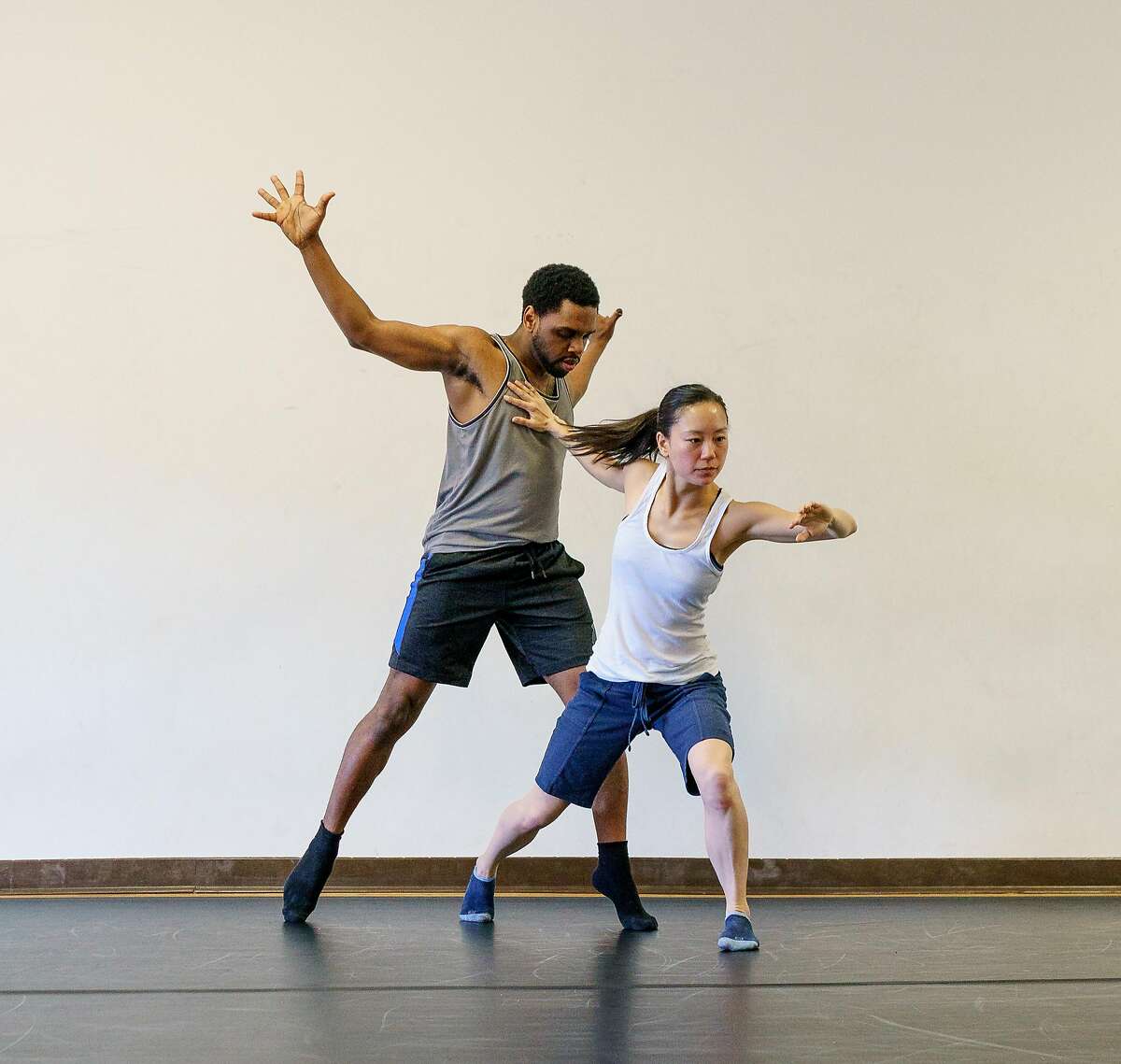 Dazaun Soleyn and Norma Fong of Robert Moses' Kin in the premiere of Moses "Triick Bags" at Dance Mission, San Francisco. The concert runs through Sunday, May 21. Photo by Steve Disenhof