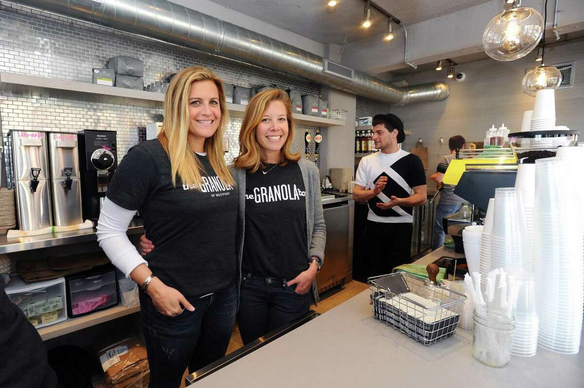The Granola Bar co-owners Julie Mountain, left, and Dana Noorily pose inside their new establishment at 700 Canal St. in Stamford, Conn. on Tuesday, May 9, 2017.