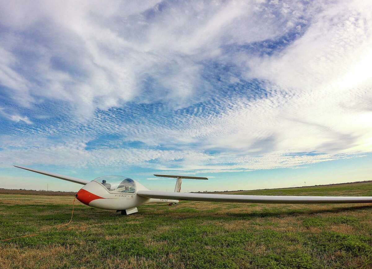 A Grob Astir glider waits on the ground at the Greater Houston Soaring Association.