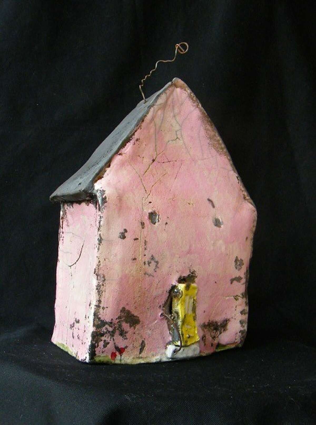 Tricia Tusa's quirky ceramic houses are on view, and for sale, at the Menil Bookstore.