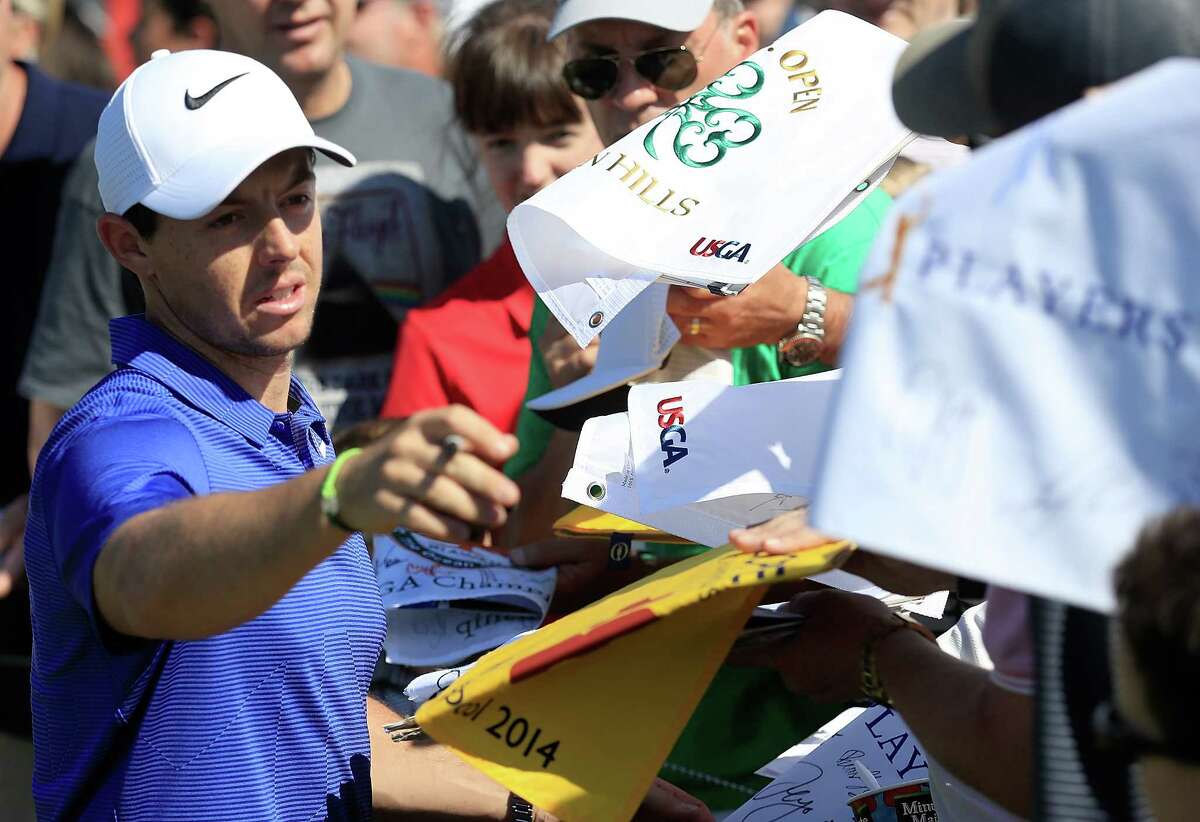 Rory McIlroy of Ireland signs autographs during a practice round prior to the THE PLAYERS Championship at the Stadium course at TPC Sawgrass on May 9, 2017 in Ponte Vedra Beach, Florida.