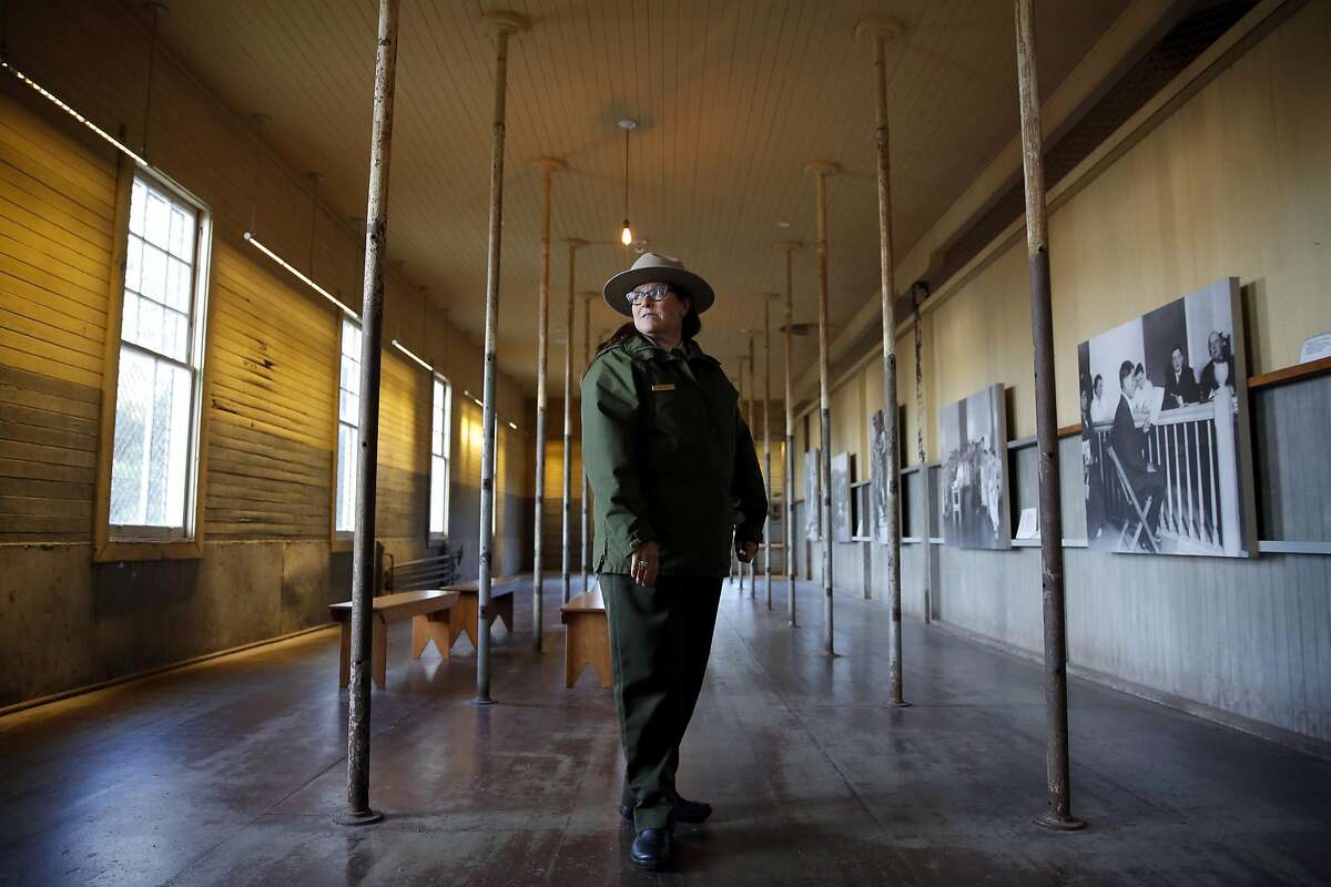 AISP Superintendent Amy Brees stands in a room of the former immigration center on Angel Island State Park, California, on Monday, Dec. 28, 2015.