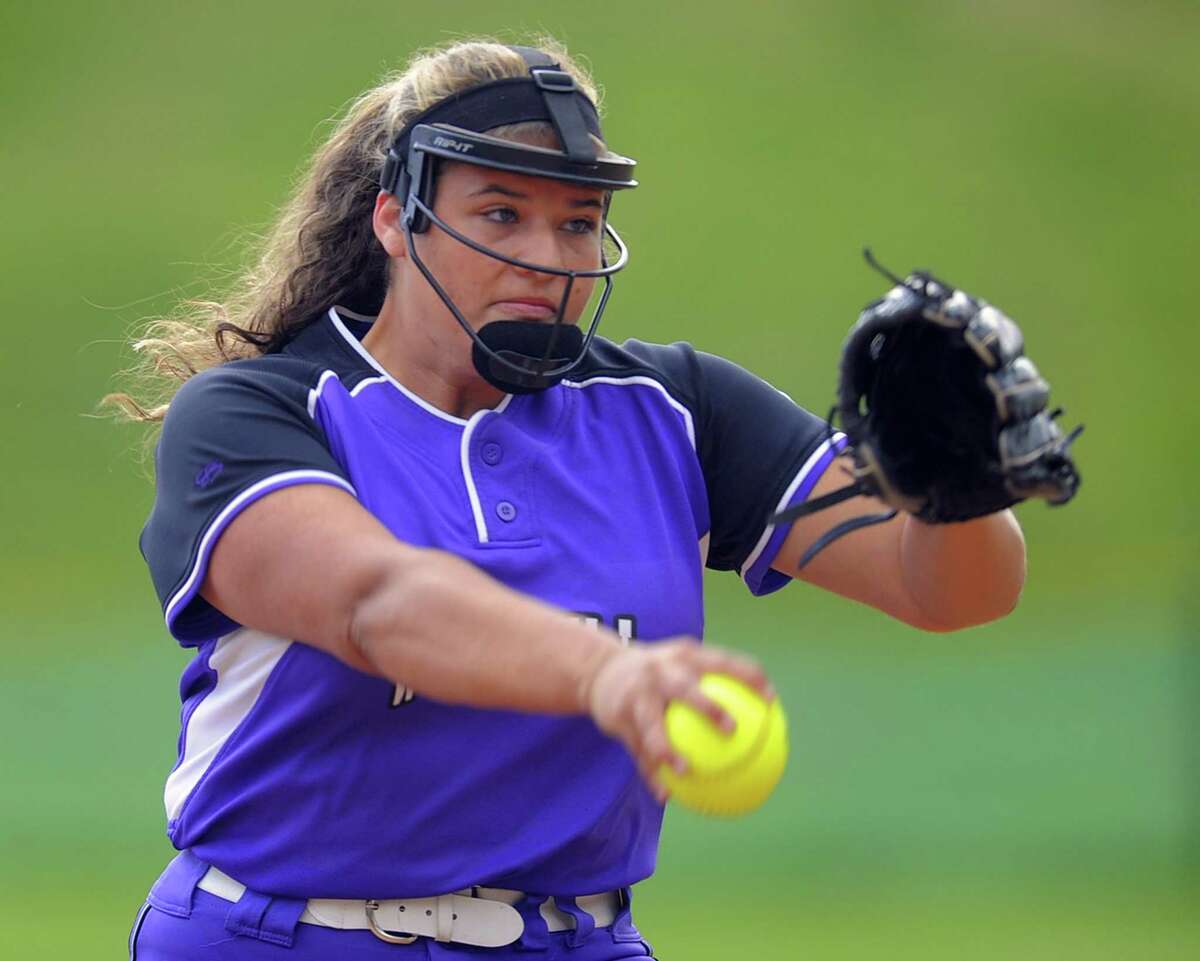 Westhill Edyliese Aquino delivers a pitch in the second inning of a varsity girls softball game against Fairfield Ludlowe at Westhill High School on May 9, 2017. Aquino's tossed a complete game five-hitter with seven strikeouts, helping the Vikings in their 4-0 win over the Falcons.
