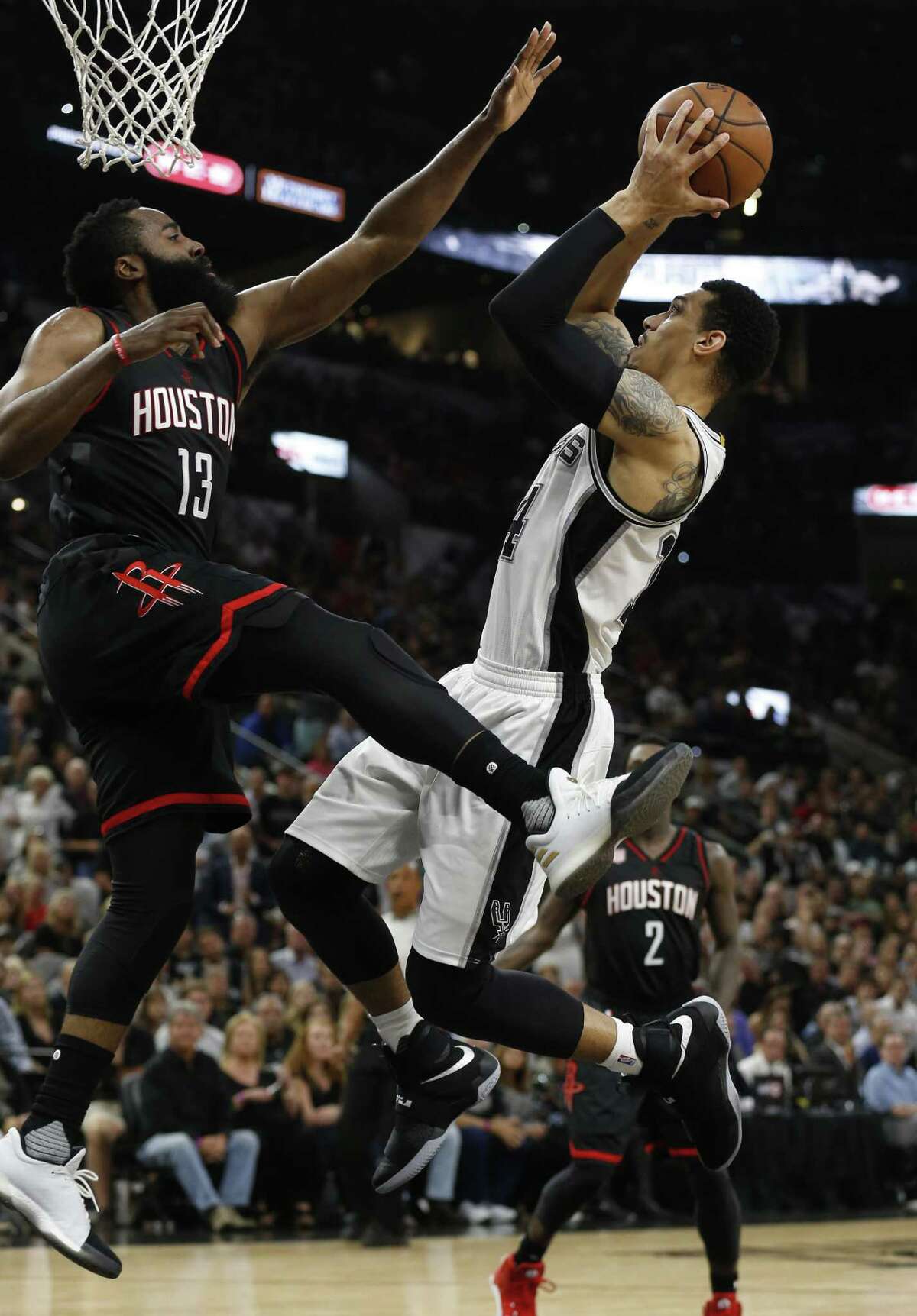 Spurs’ Danny Green attempts a shot against the Rockets’ James Harden in Game 5 at the AT&T Center on May 9, 2017.