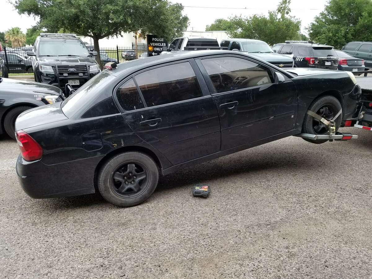 Police officers saw bundles of marijuana in plain sight within this black Chevy Malibu.