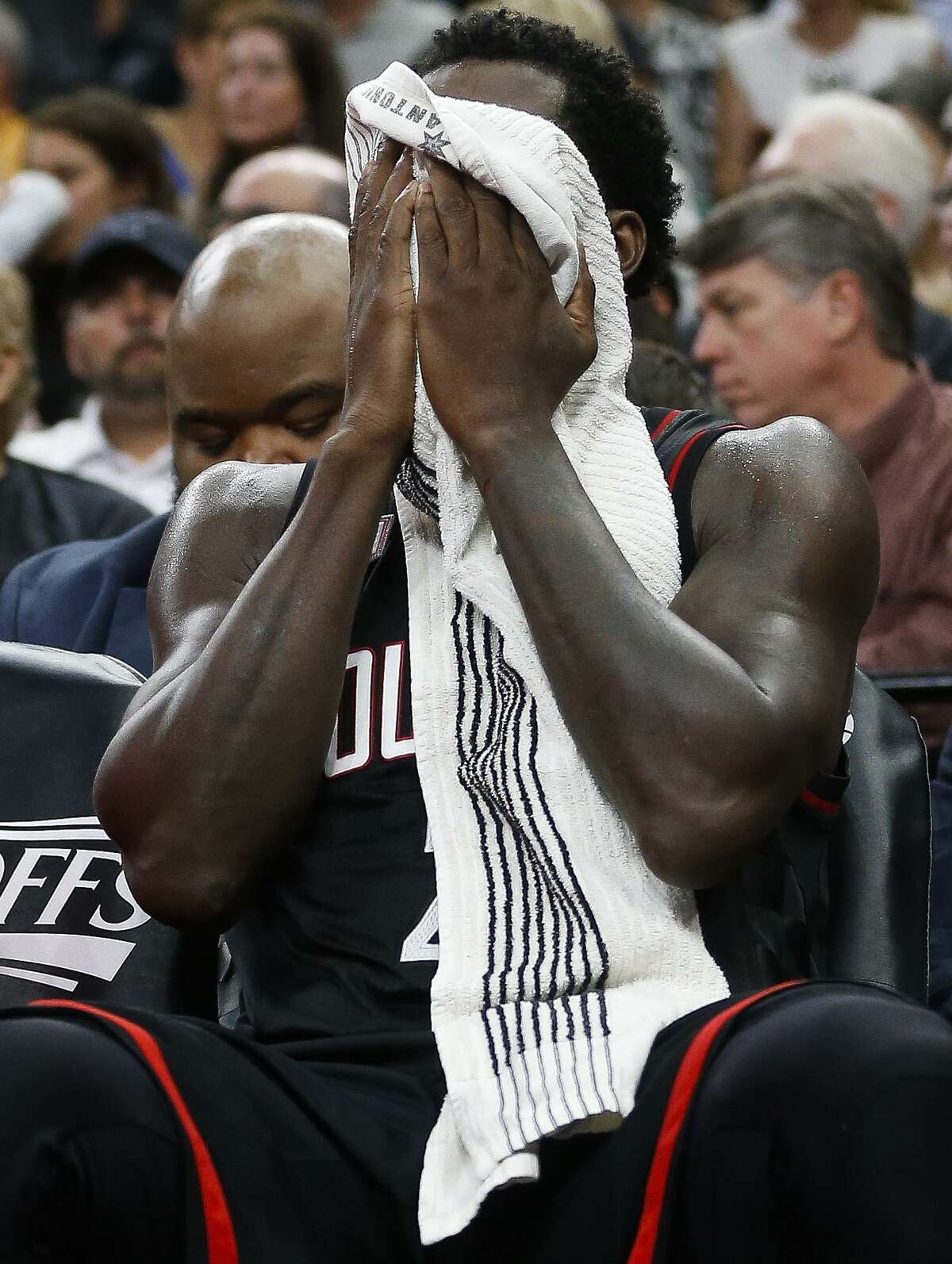 Rockets guard Patrick Beverley wipes his face as he sits down on the bench during the second half of Game 5 against the Spurs at the AT&T Center on May 9, 2017, in San Antonio.