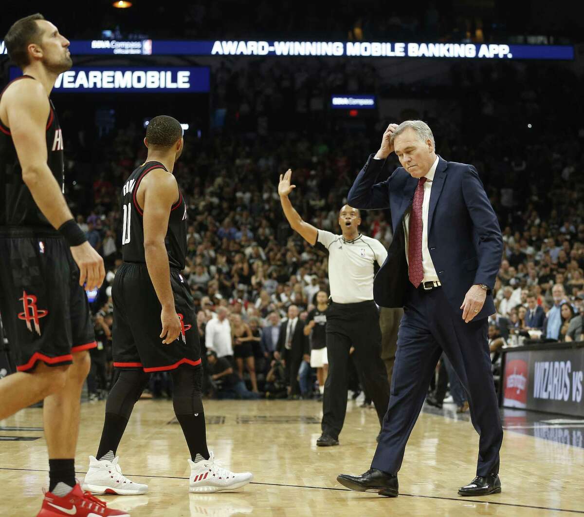 Rockets coach Mike D’Antoni reacts as he walks out for a timeout in the final seconds during overtime of Game 5 against the Spurs at the AT&T Center on May 9, 2017, in San Antonio.