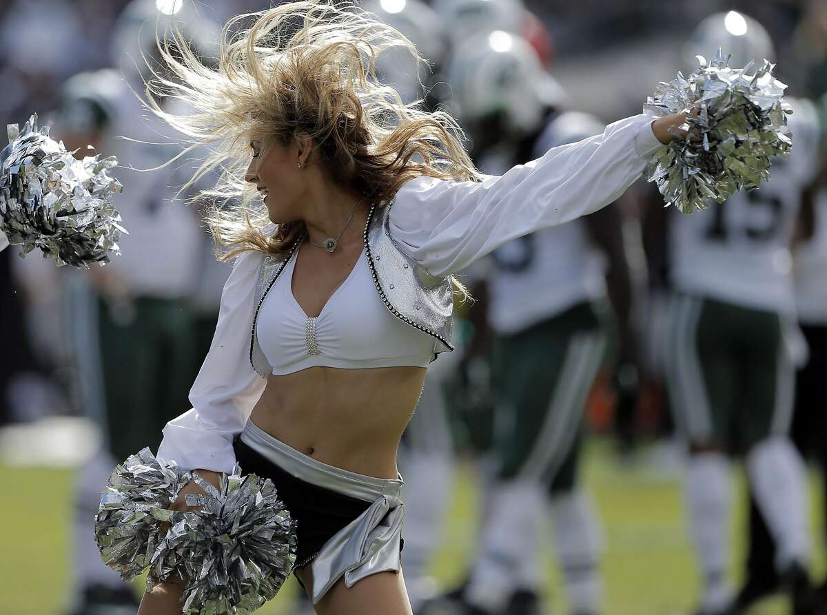 Raiderettes perform during a break in the first half as the Oakland Raiders played the New York Jets at O.co Coliseum in Oakland, Calif., on Sunday, November 1, 2015.