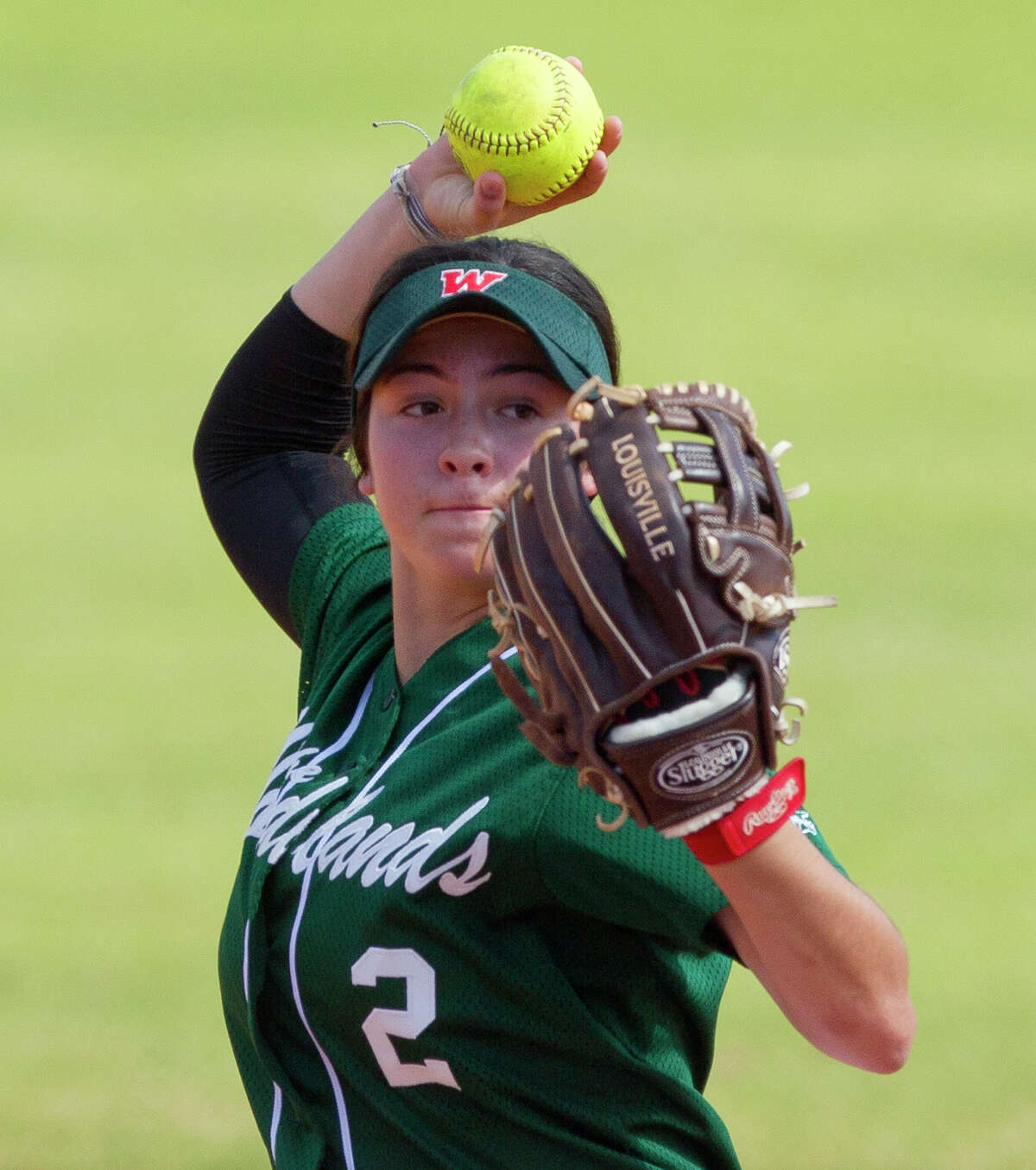 The Woodlands shortstop Abby Jones (2) warms up between innings during a high school softball game at The Woodlands Varsity Round Robin Invitational at The Woodlands High School Friday, Feb. 24, 2017, in The Woodlands.