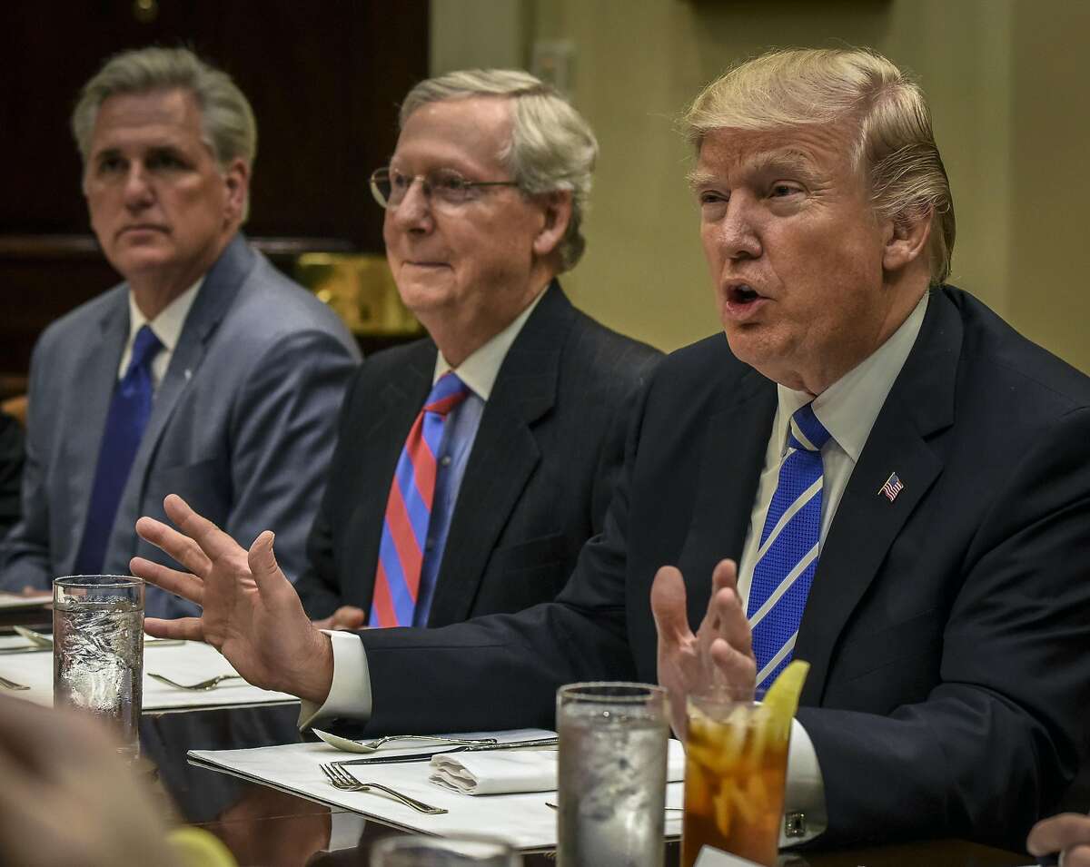 President Donald Trump (right) meets with Republican leadership, including Senate Majority Leader Mitch McConnell, R-Ky. (center) and Kevin McCarthy, R-Calif (left) at the White House on March, 1, 2017 in Washington. MUST CREDIT: Washington Post photo by Bill O'Leary.